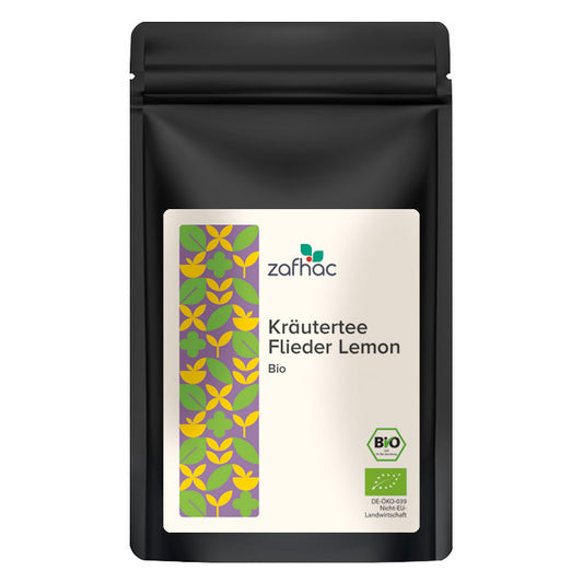 Schwarze Verpackung mit Aufschrift „Kräutertee Flieder Lemon Bio“